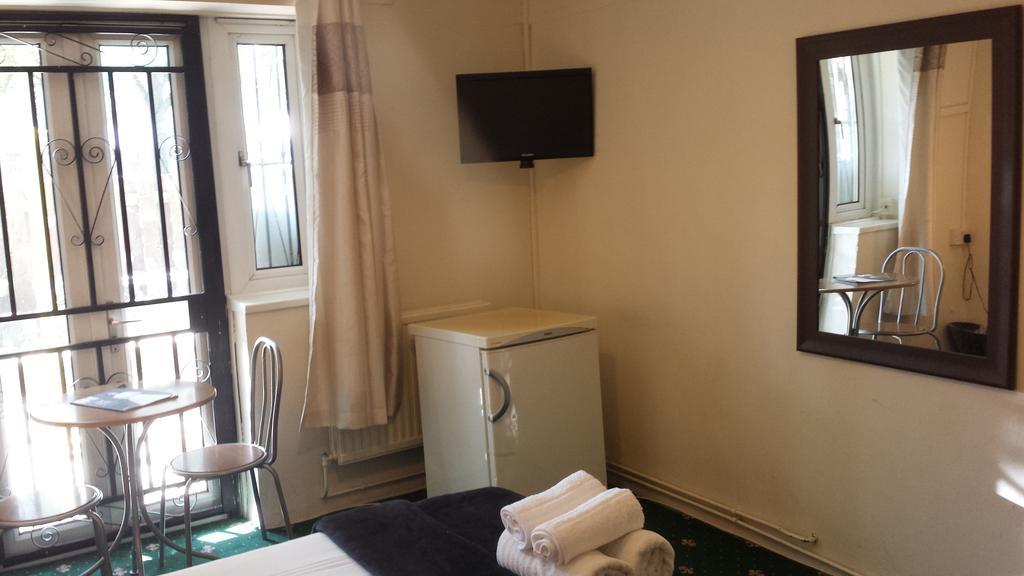 Whitechapel Rooms Лондон Номер фото